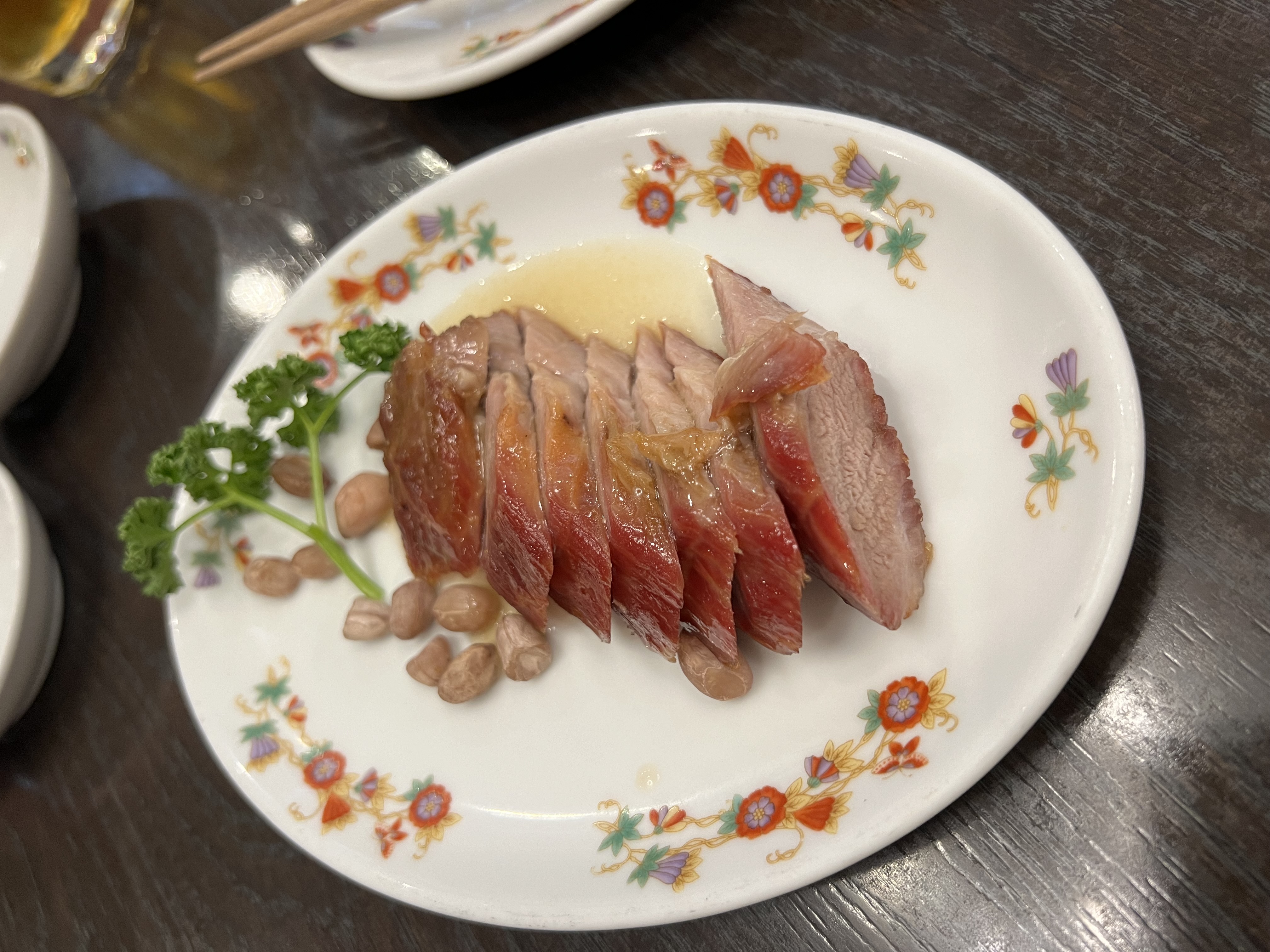 Char siu on a floral plate